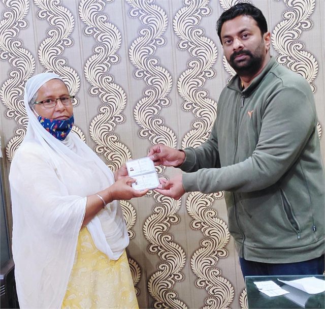 Providing Golden Cards of the staff members to Medical Officer of Jammu University